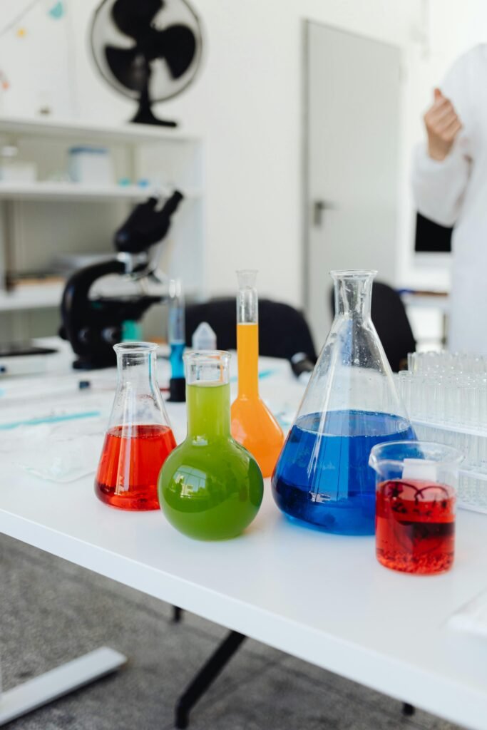 pexels-photo-8539753-8539753 A vibrant display of colored liquids in glassware during a laboratory experiment.